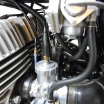 Kawasaki H2 750 - 1975 - Carburettors with cables and fuel lines.