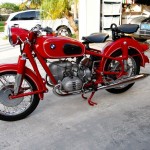 BMW R60/2 - 1966 - Left Side View, Motor and Transmission, Granada Red Paint, Front Forks and Wheels.