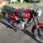 BSA Rocket 111 - 1969 - Right Side View, Reflector, Exhaust Headers, Front Forks and BSA Badge.