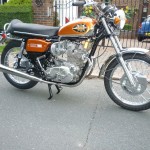 BSA Rocket 3 - 1971 - Right Side View, Kick Start, Tank, Side Panel, Engine Case, Front Mudguard, Carbs and Stand.