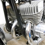 Kawasaki H2 750 - 1975 - Engine detail with the exhausts and cylinder head.