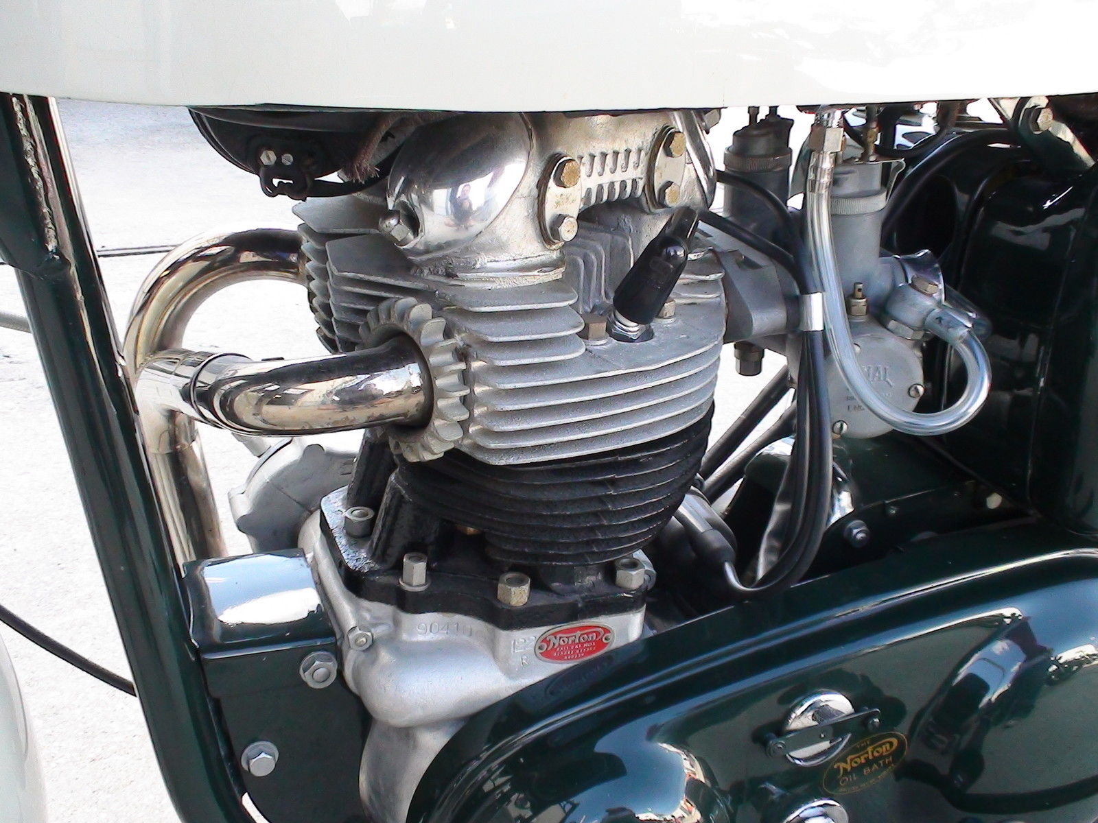 Norton Dominator 88 - 1960 - Siamese Exhaust System, Cylinder Head, Chain Cover and Spark Plug.
