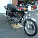 Triumph Trident T140V - 1973 - Front Stainless Wheel Rim, Front Fender, Headlight and Forks.