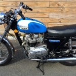 Triumph Tiger - 1973 - Left Side View, Transmission Cover, Triumph Tiger Badge, Seat and Reflector.