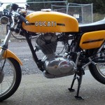 Ducati Desmo 250 - 1974 - Left Side View, Petrol Tank, Side Panel and Engine.