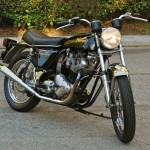 Norton Commando - 1974 - Front Fender, Mudguard, Forks, Wheel, Headlight, Side Stand and Exhausts.