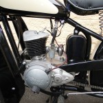 BSA Bantam - 1953 - Motor and Transmission, Rear Brake Pedal, Carburettor, Seat Spring and Toolbox.