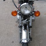Honda 400 Four - 1976 - Headlight, Indicators, Front Mudguard, Front Forks and Wheel.