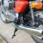 Suzuki GT380 - 1973 - Shock Absorber, Chain Guard, Footrest, Chain Case and Indicator.