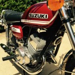 Suzuki T250 - 1972 - Horn, Exhausts, Forks Tubes, Engine Cases and Oil Tank,