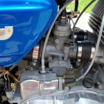 Suzuki T500 - 1973 - Oil Pump Cover, Tacho Cable, Oil Filler Cap and Inlet.
