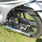 Triumph Speed Twin - 1964 - Rear Wheel, Brake Rod, Shock Absorber, Chain Guard, Silencer and Footrest.